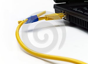 Broken network cable from laptop connected anyhow with insulating tape