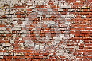 Broken Old Bricklaying From Red White Bricks And Damaged Plaster