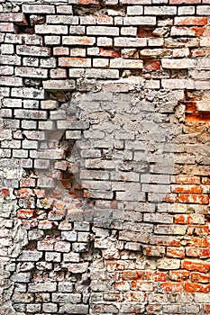 Broken Old Bricklaying From Red White Bricks And Damaged Plaster