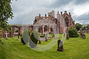 The broken old cathedral of Melrose Abbey in Scotland