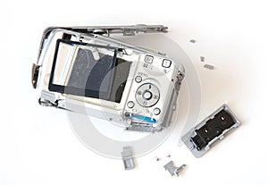 Broken old digital camera isolated, obsolete and not in use anymore