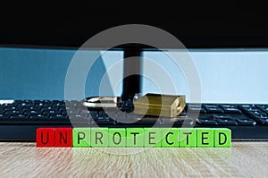 Broken padlock on black computer keyboard