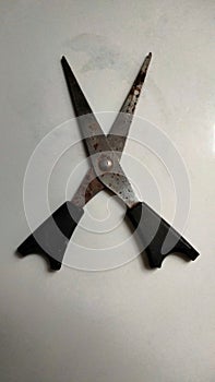 Broken pair of rusty scissors