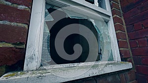 Broken Pane of Wire-Reinforced Window Glass in Vandalised Derelict Building