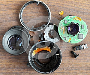 Broken Parts of an Unidentifiable Electronic Camera Lens
