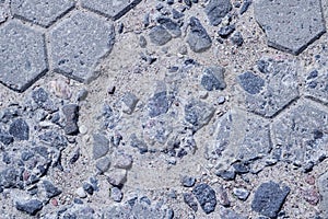 Broken pavement tile close up, background