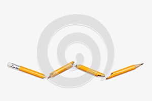 Broken pencil on white horizontal background with free space for text