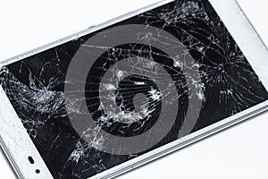Broken phone with cracked screen