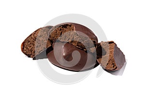 Broken piece of chocolate candy with cocoa filling mousse