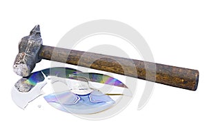 Broken into pieces cd disk and hammer