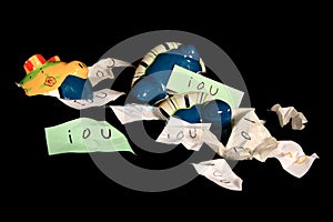 Broken piggy bank with iou's