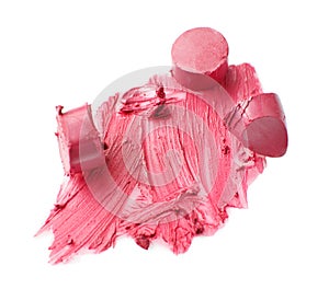 Broken pink lipstick with strokes on white background