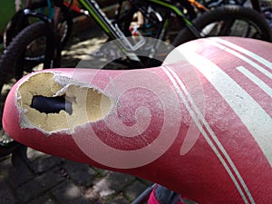 Broken pink young girl Bicycle Saddle