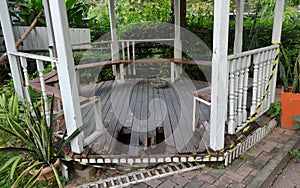 Broken plank floor of abandoned pavilion