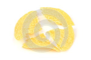 Broken potato chips isolated on white background