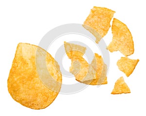 Broken potato chips isolated on white background, top view