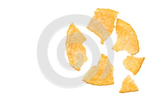 Broken potato chips isolated on white background, top view
