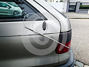 Broken radio antenna on car 