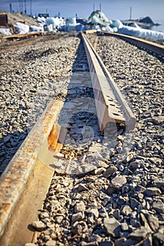 Broken railway in sea port