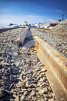 Broken railway in sea port