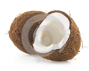 Broken raw ripe coconut