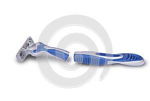 Broken razor on white background
