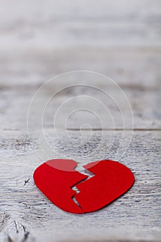 Broken red felt heart