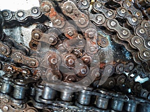 broken and rusted motorcycle chains wear out with time