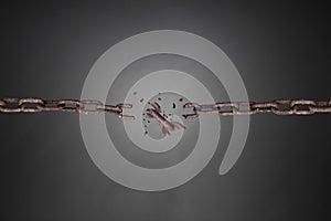 Broken rusty iron chain isolated on gray