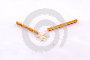 Broken salty bread stick isolated