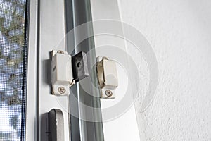 Broken security magnetic lock  contact for mosquito wire screen window, Repair Room concept