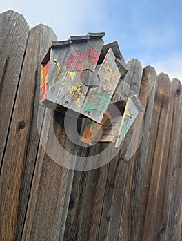 Broken shattered bird house