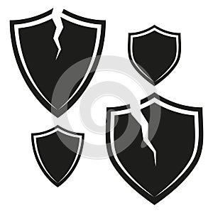 Broken shield icon. Protection failure symbol. Cracked defense shape. Simple vector graphic.