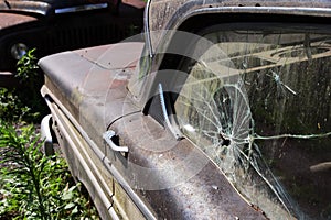 Broken side window in an old car