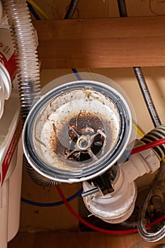 Broken sink in the kitchen. Clogged sink drain. Plumbing services. Drain and osmotic water filtration system