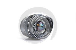 Broken SLR camera lens. Concept of careless attitude to photography
