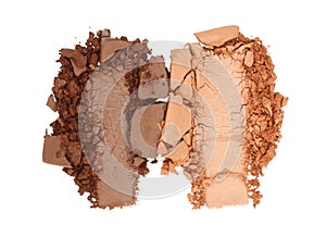 Broken and smashed make-up eyeshadow pallete, lay of brush strokes, on white background, top view. Sample cosmetics concept