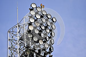 Broken spotlight on sports arena floodlights