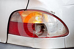 Broken tail lamp.