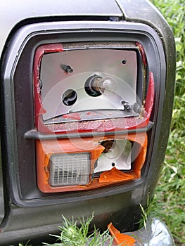Broken tail light of a car