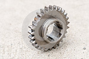 Broken teeth on the gear. Mechanical workshop and repair concept. Closeup and isolated