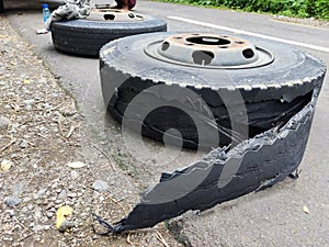 Broken tire at the street