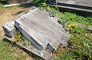 Broken tombstone in the public cemtery