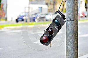 Broken traffic lights pole