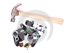 Broken video game controller on white background