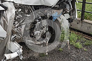 A broken white van in the parking lot