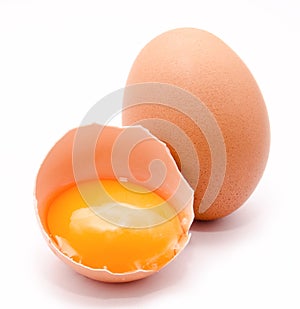 Broken and whole chicken eggs with yolk isolated