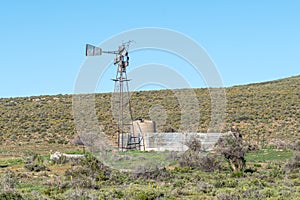 Broken windmill, dam and tank above Ouberg Pass near Sutherland