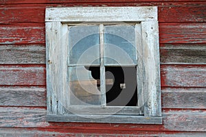 Broken window on barn