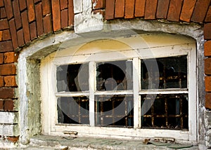 Window in an old red brick building